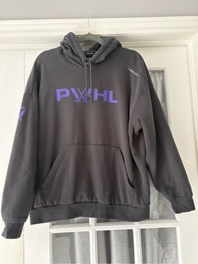 PWHL Black Hoodie W/ purple logo.